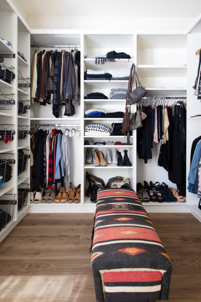 Inspiration for a rustic light wood floor closet remodel with shaker cabinets and white cabinets