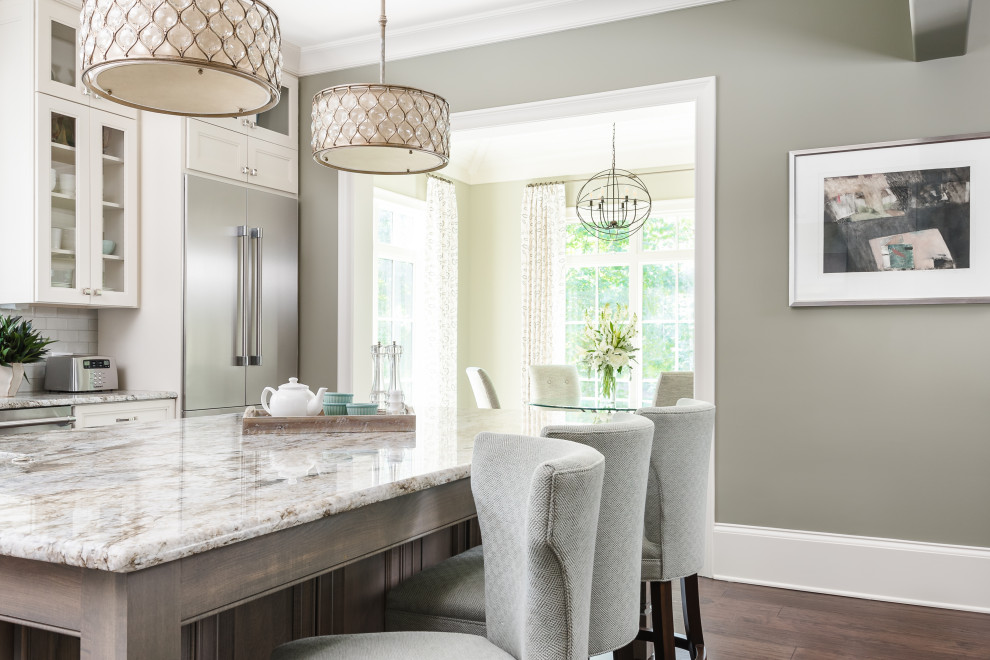 Large transitional l-shaped dark wood floor and brown floor eat-in kitchen photo in Charlotte with flat-panel cabinets, white cabinets, granite countertops, stainless steel appliances and an island