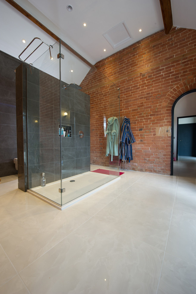 Inspiration for a contemporary bathroom in Oxfordshire with gray tile, porcelain tile, porcelain floors and beige floor.