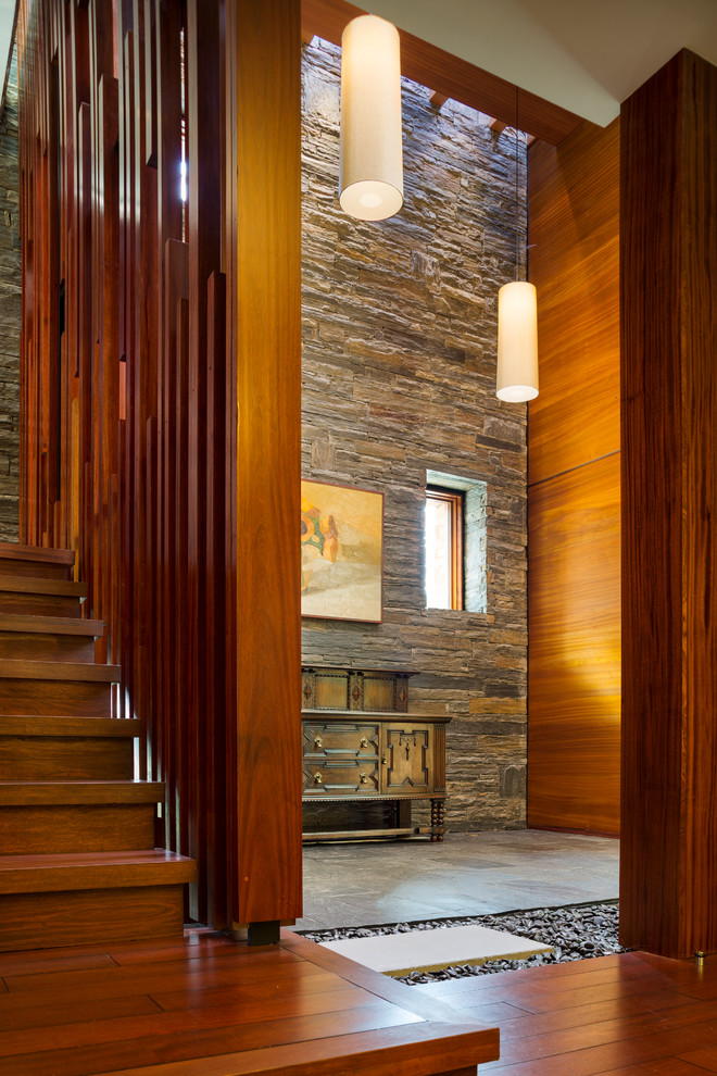 Example of a large minimalist foyer design in DC Metro