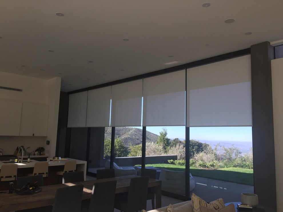 Example of a mountain style home design design in Orange County