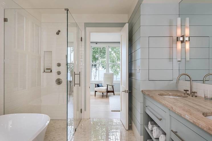 Design ideas for a mid-sized beach style master bathroom in DC Metro with flat-panel cabinets, grey cabinets, a freestanding tub, a corner shower, white tile, subway tile, white walls, limestone floors, an undermount sink, quartzite benchtops, beige floor and a hinged shower door.