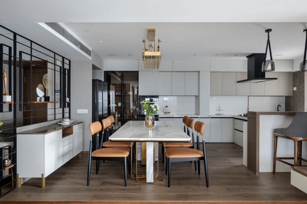 Inspiration for a contemporary dining room in Mumbai.