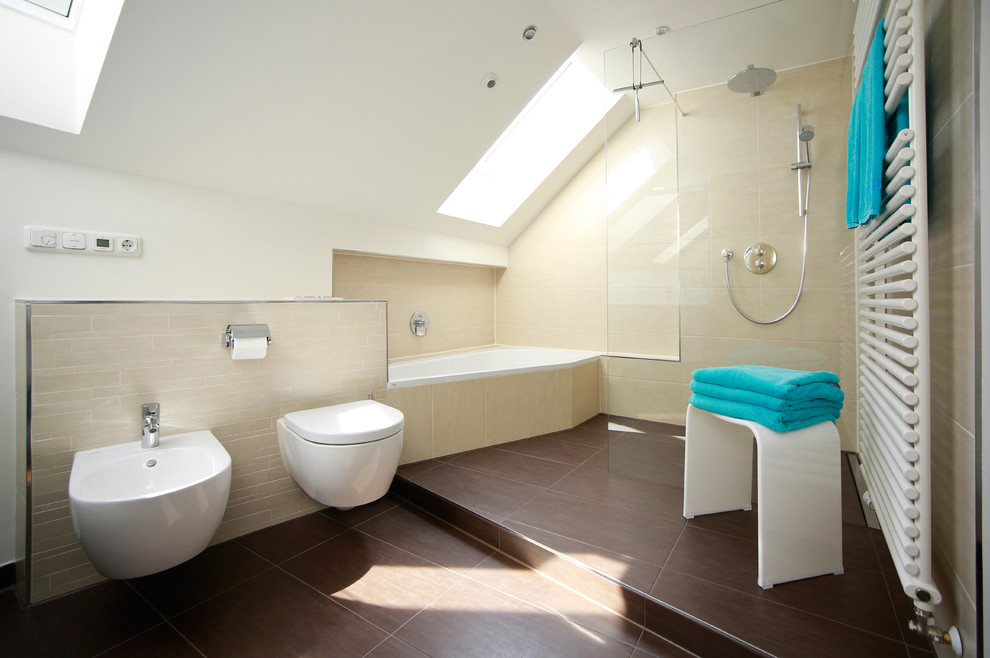 Large contemporary bathroom in Munich with a corner tub, an open shower, a wall-mount toilet, beige tile and an open shower.