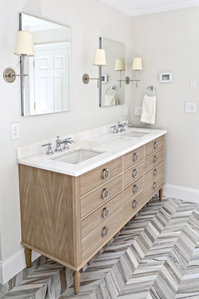 Large transitional master white tile and marble tile marble floor and multicolored floor freestanding bathtub photo with furniture-like cabinets, distressed cabinets, gray walls, an undermount sink, marble countertops, a hinged shower door and white countertops