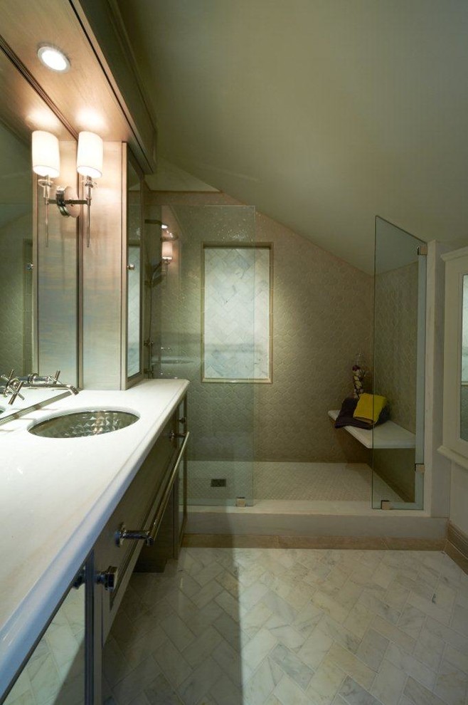 Photo of a mid-sized transitional master wet room bathroom in Los Angeles with flat-panel cabinets, light wood cabinets, mosaic tile floors, an undermount sink, limestone benchtops and a sliding shower screen.