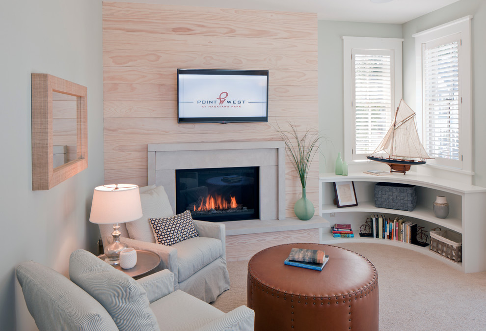 Inspiration for a beach style bedroom in Grand Rapids with grey walls, carpet and a standard fireplace.