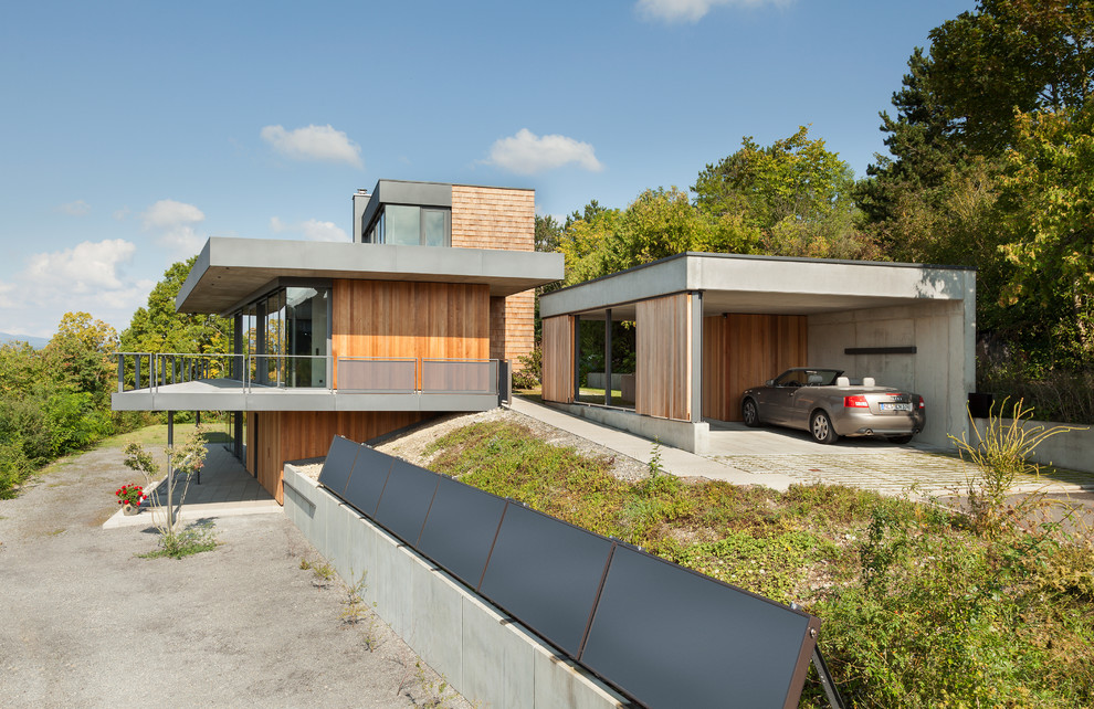 Photo of a mid-sized modern two-car garage in Other.