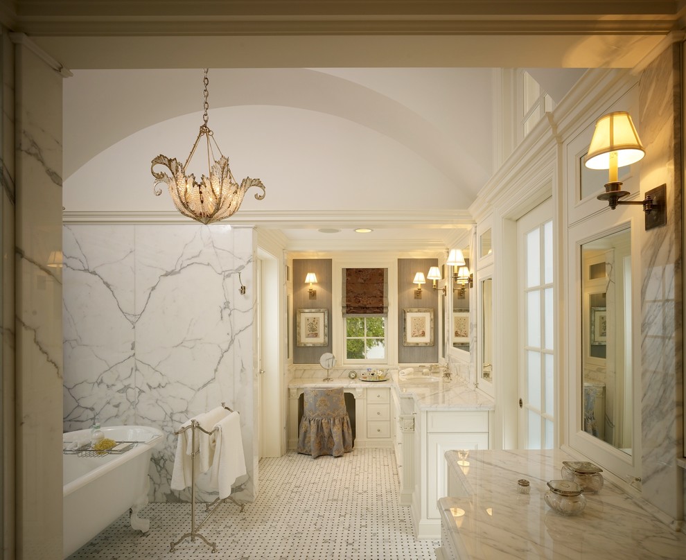 Inspiration for a large traditional master bathroom in Chicago with shaker cabinets, marble benchtops, a claw-foot tub, white tile, white walls, white cabinets, stone slab and mosaic tile floors.