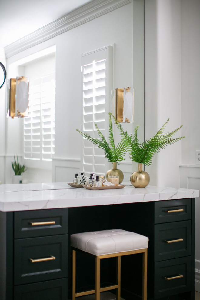 Design ideas for a bathroom in Orange County with marble benchtops and green cabinets.