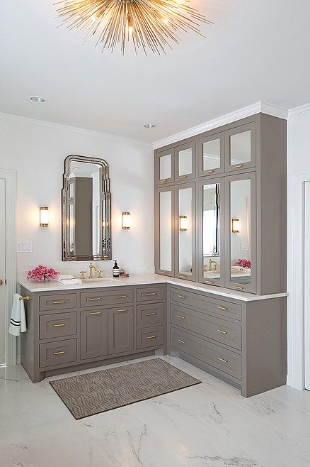 Example of a mid-sized transitional master gray tile, white tile and stone tile marble floor freestanding bathtub design in Houston with shaker cabinets, beige cabinets, white walls, an integrated sink and solid surface countertops