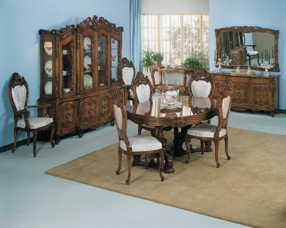 Design ideas for a mid-sized traditional separate dining room in Chicago with blue walls, carpet, beige floor and no fireplace.