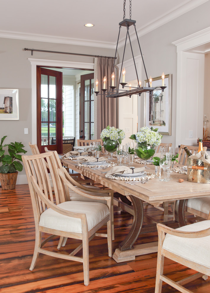 Inspiration for a country dining room in Atlanta with grey walls and medium hardwood floors.