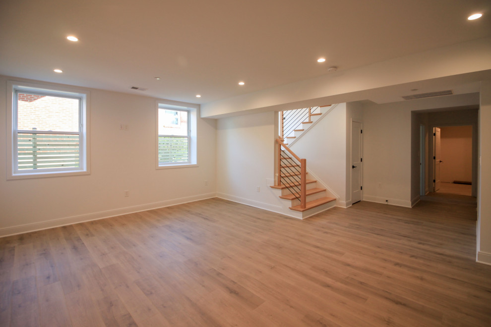 Mid-sized trendy wooden floating mixed material railing and shiplap wall staircase photo in DC Metro with painted risers