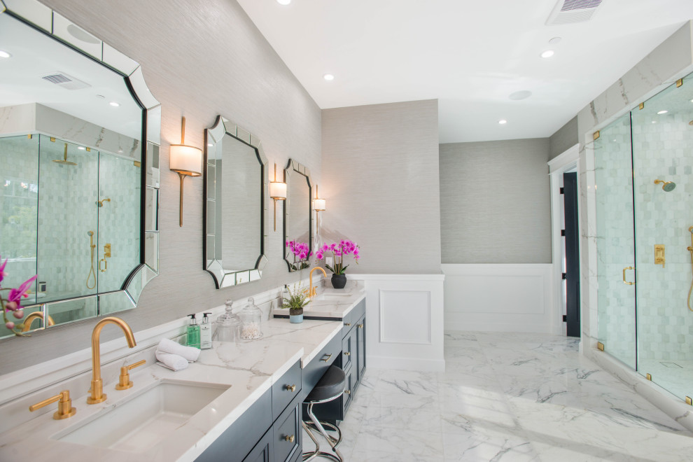 Alcove shower - large transitional master gray floor, double-sink and wainscoting alcove shower idea in Los Angeles with recessed-panel cabinets, gray cabinets, gray walls, an undermount sink, a hinged shower door, gray countertops and a built-in vanity