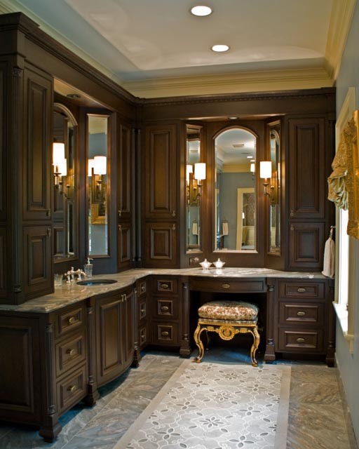 Inspiration for a mid-sized traditional master bathroom in Cleveland with an undermount sink, recessed-panel cabinets, dark wood cabinets, blue walls and grey floor.