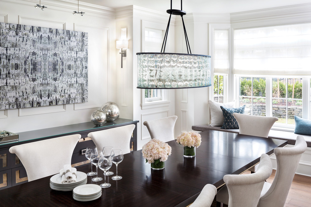 Example of a transitional dining room design in Vancouver