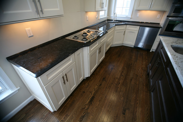 two tone kitchen: antique brown granite & millennium cream granite