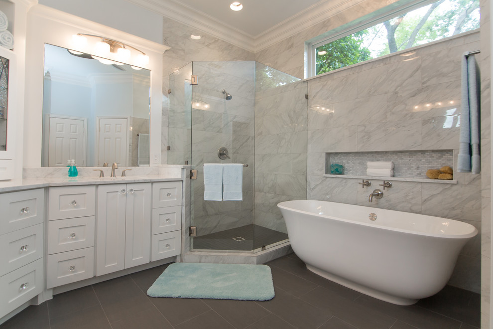 Bathroom | Elegant Custom Cabinets | Marble Tile & Freestanding Tub