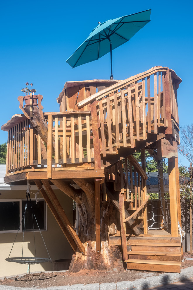 Inspiration for an arts and crafts garden in San Francisco with with outdoor playset.