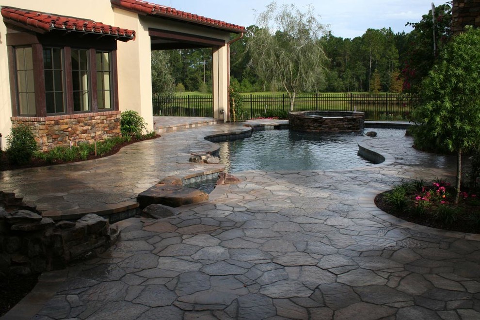 Inspiration for a rustic pool remodel in Orlando