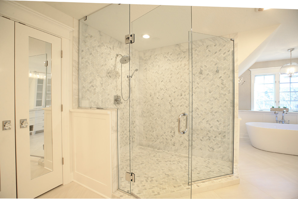 Inspiration for a mid-sized transitional master marble tile porcelain tile and white floor freestanding bathtub remodel with shaker cabinets and white cabinets