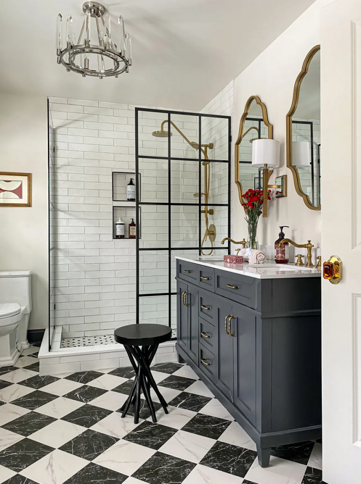 Inspiration for a mid-sized traditional master bathroom in Chicago with grey cabinets, an open shower, a one-piece toilet, white tile, subway tile, white walls, ceramic floors, quartzite benchtops, an open shower, white benchtops, a double vanity and a freestanding vanity.