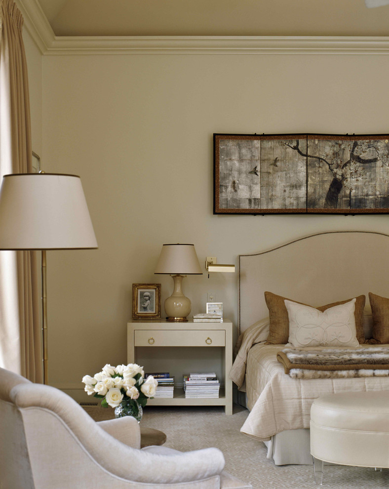 Inspiration for a traditional bedroom in New York with beige walls.