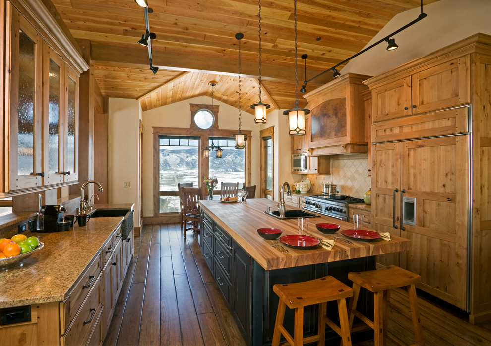 Example of a mountain style kitchen design in Denver