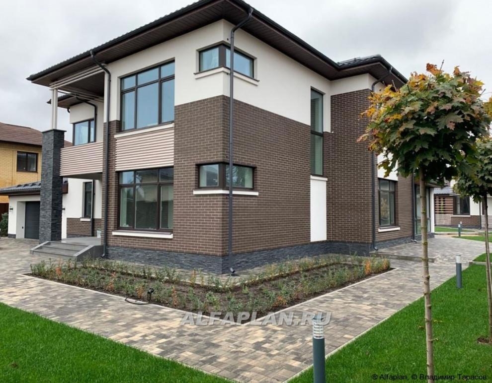 560B «ПРАЙД» - современный коттедж с остекленной верандой и гаражом