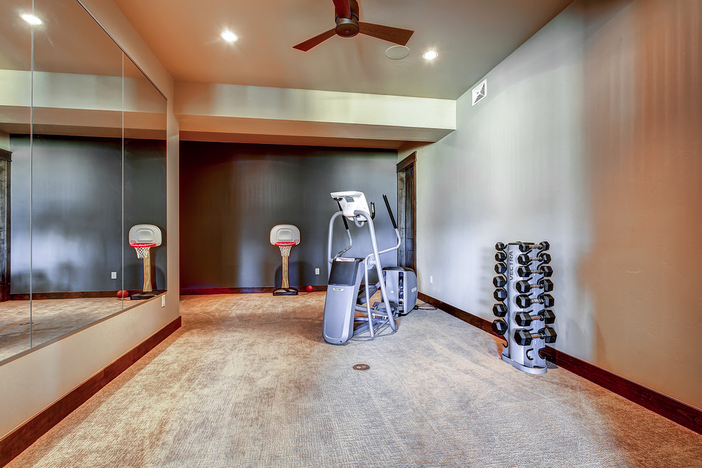 Example of a mountain style home gym design in Denver
