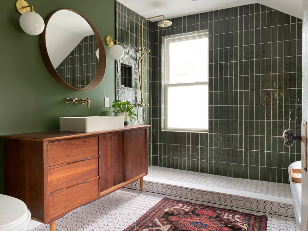 Inspiration for a mid-sized midcentury master bathroom in Other with medium wood cabinets, a claw-foot tub, an open shower, a bidet, green tile, ceramic tile, green walls, cement tiles, a vessel sink, white floor, an open shower, a shower seat, a single vanity and a freestanding vanity.