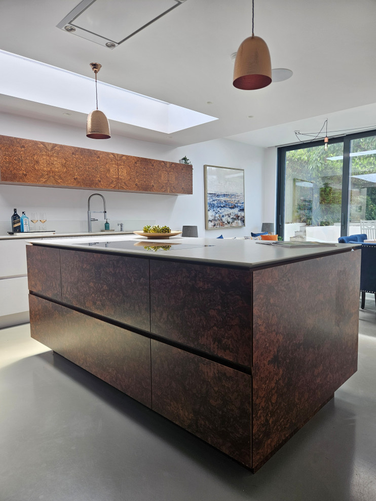 Bespoke Handleless Kitchen with Walnut Accents