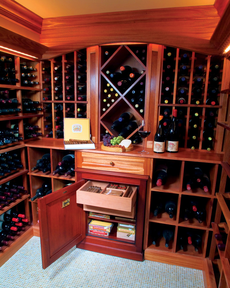 This is an example of a traditional wine cellar in New York with storage racks and blue floor.