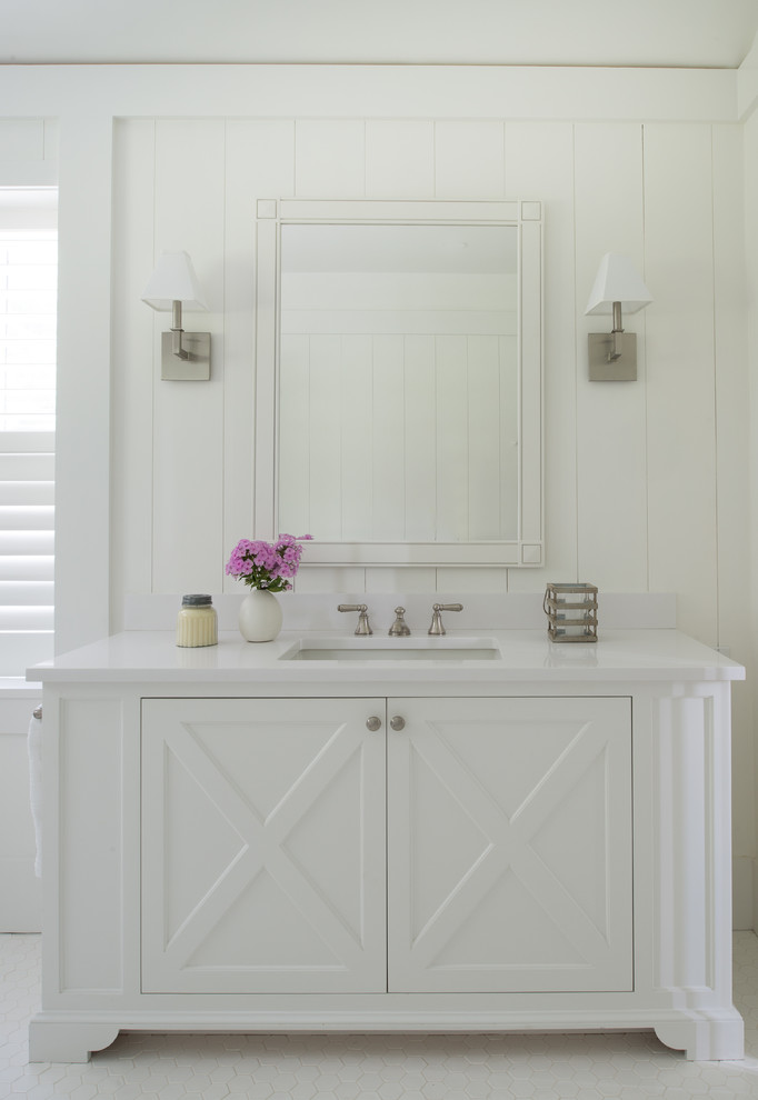 Inspiration for a large beach style bathroom in San Francisco with white cabinets, white walls, linoleum floors, white floor, white benchtops, an undermount sink and recessed-panel cabinets.