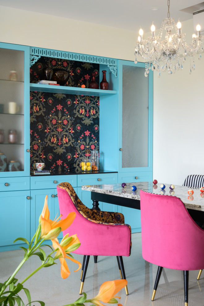 Photo of an eclectic dining room in Mumbai With White Walls and Gray.