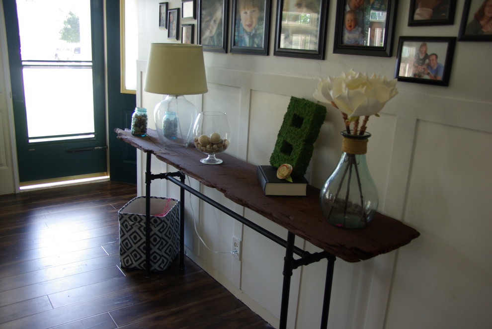 Inspiration for a large arts and crafts foyer in Other with grey walls and dark hardwood floors.
