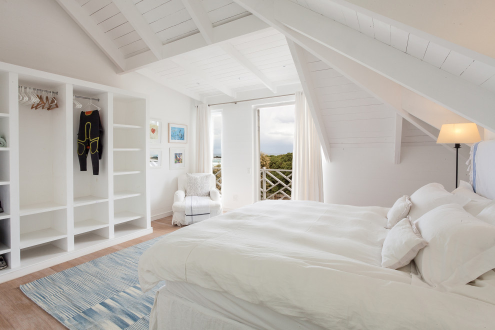 This is an example of a beach style bedroom in Devon.