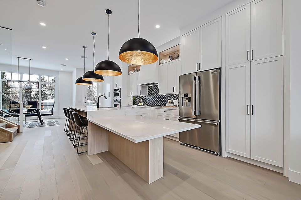 Transitional home design photo in Calgary