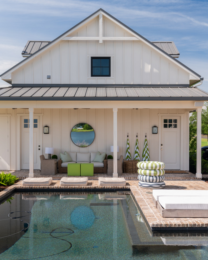 This is an example of a beach style pool in Dallas.