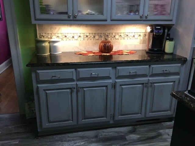 Example of a transitional home design design in Raleigh