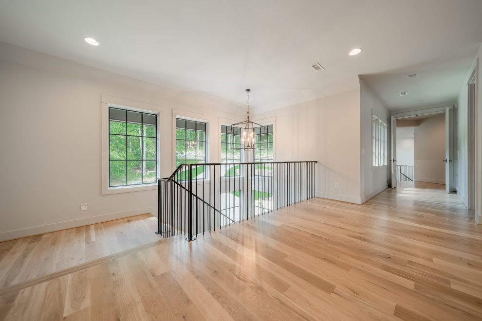 Example of a transitional home design design in Birmingham