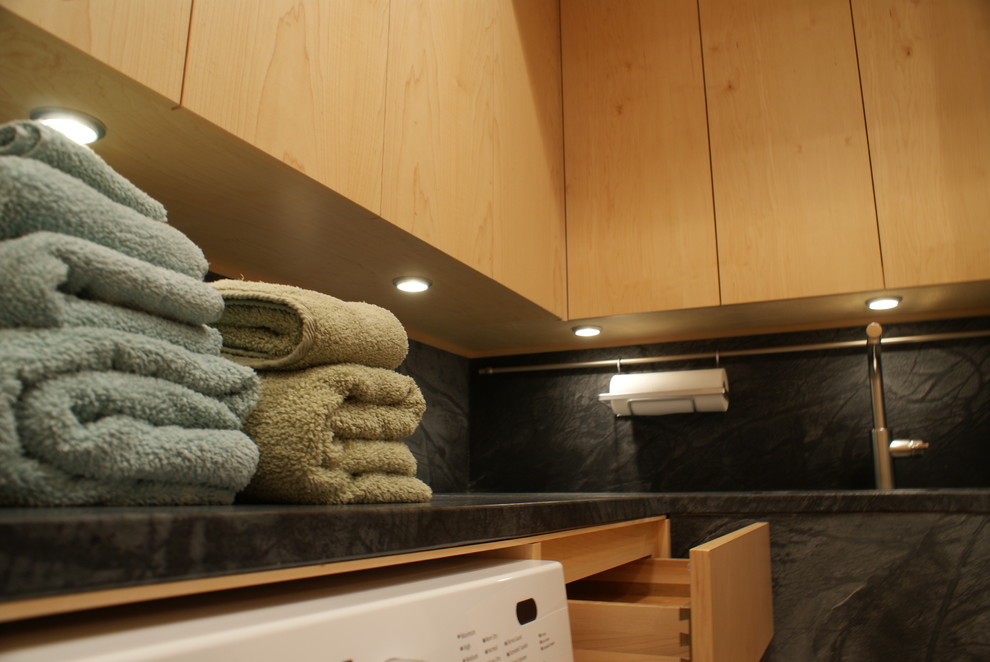 Contemporary laundry room in Other.