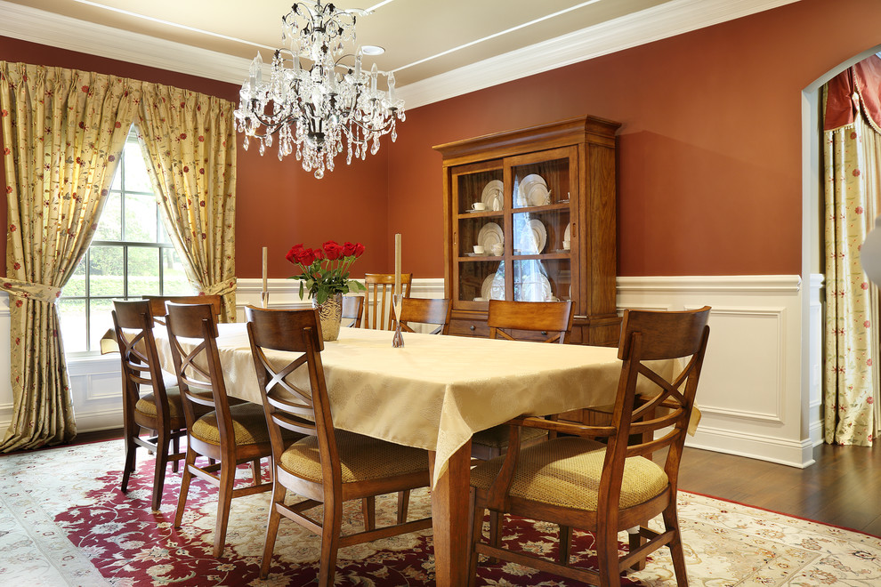 Large transitional separate dining room in New York with brown walls, medium hardwood floors and no fireplace.