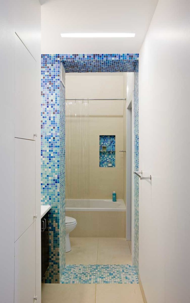 Design ideas for a contemporary bathroom in New York with mosaic tile.