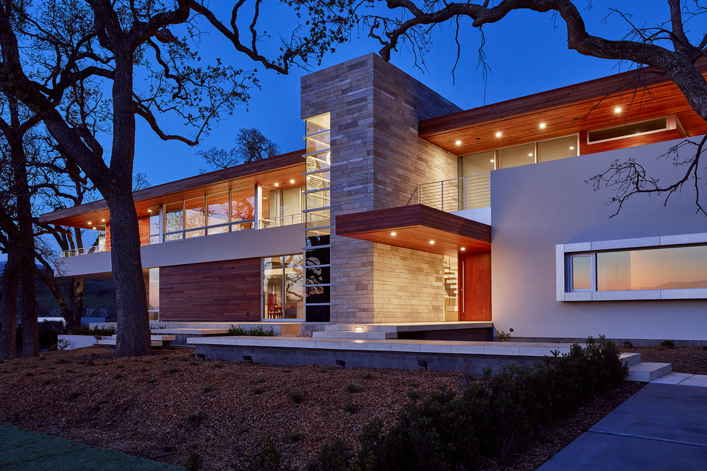 Large contemporary two-storey beige exterior in San Francisco with mixed siding and a flat roof.