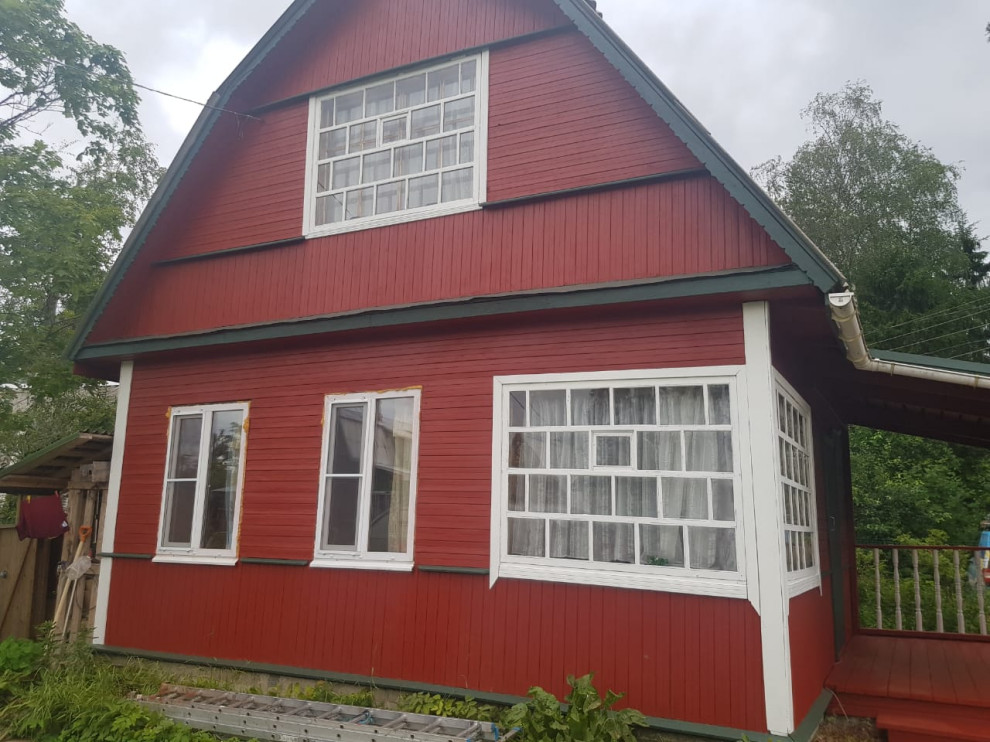 Покраска деревянного дома