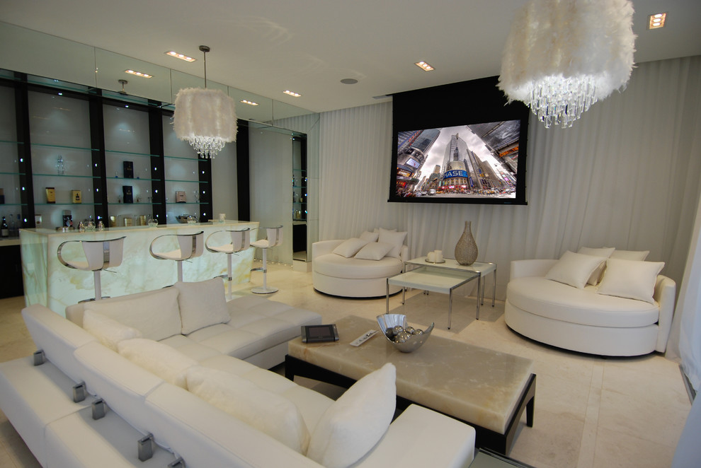 Photo of a mid-sized modern enclosed home theatre in Toronto with white walls, marble floors and a projector screen.