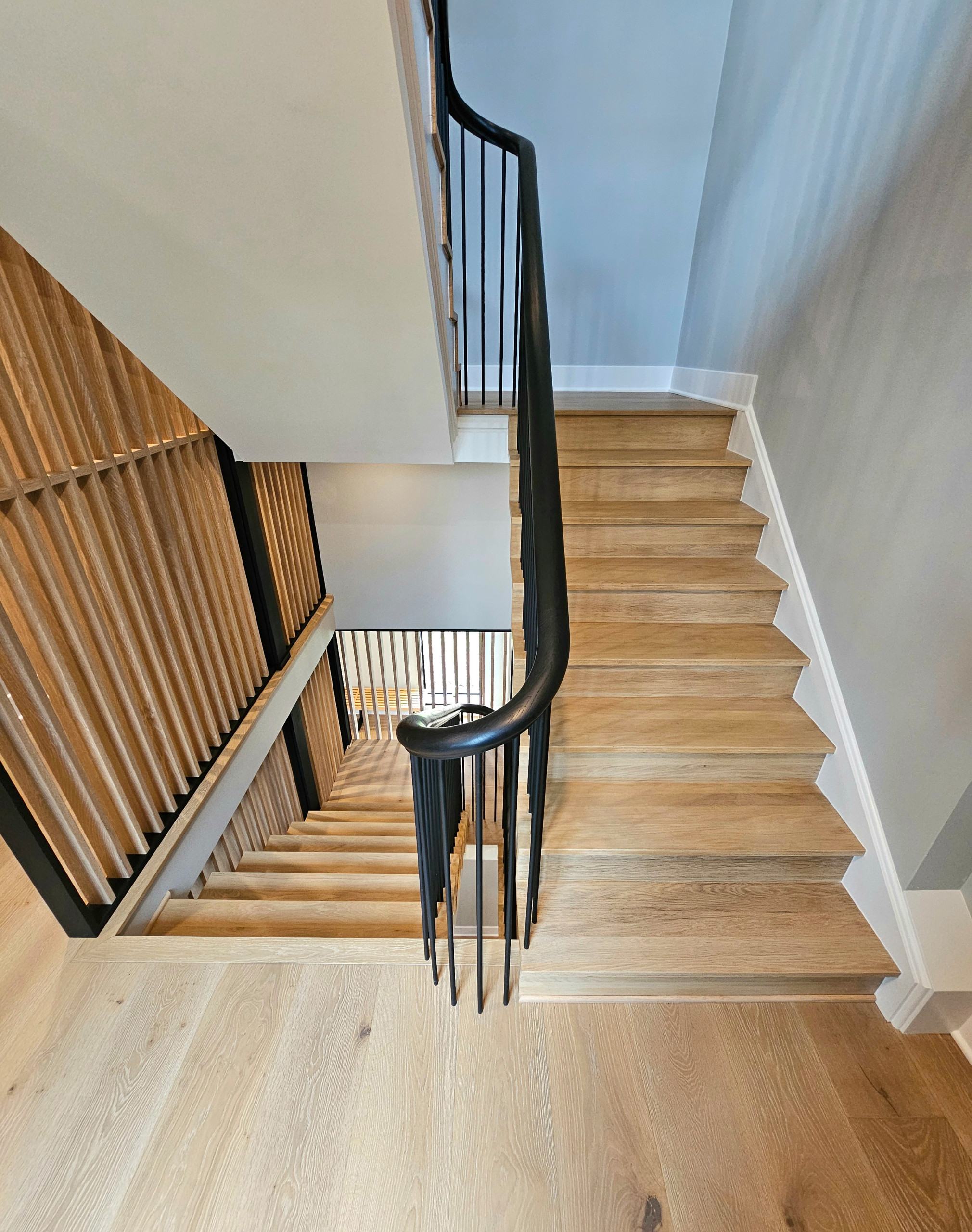 115_Stunning Continuous Rail System on 3 Story Floating Stairs; Arlington, VA 22