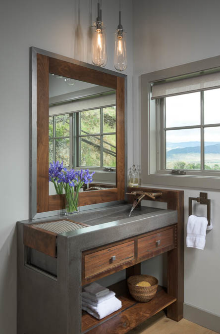 Inspiration for a mid-sized modern 3/4 bathroom in Other with an integrated sink, open cabinets, medium wood cabinets, concrete benchtops, grey walls and light hardwood floors.